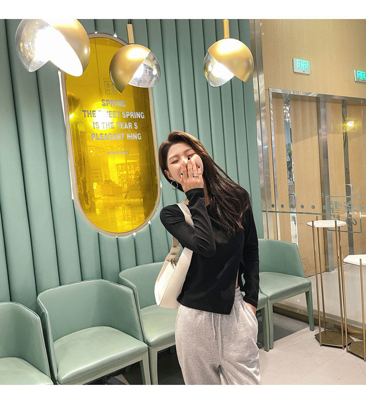 2022春新不规则设计感侧开叉T恤女长袖圆领修身短款纯色打底上衣详情11