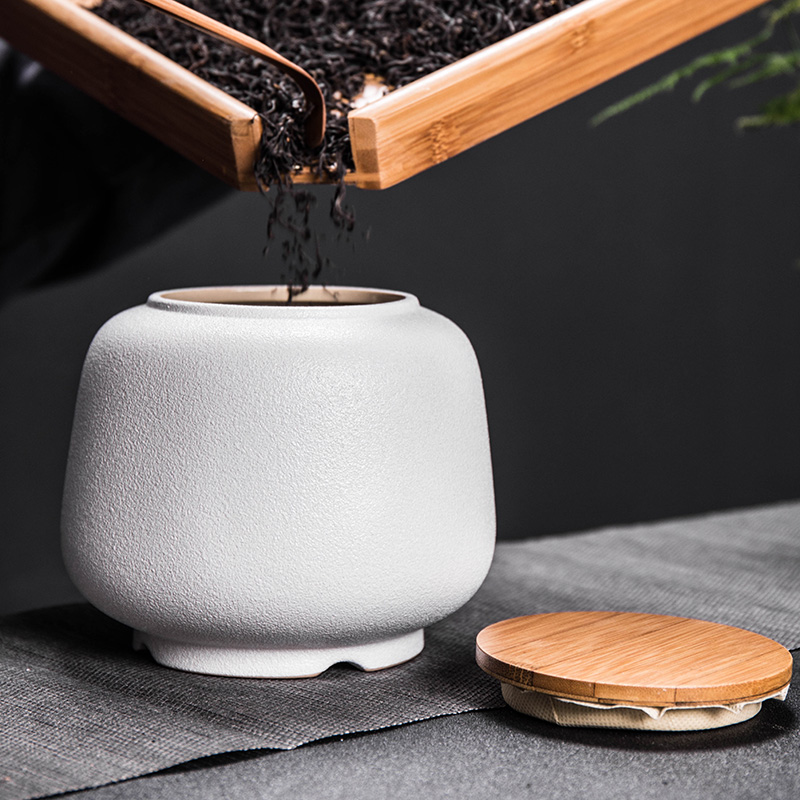 Treasure minister 's ceramic tea pot seal pot of black household size small storage jar small caddy fixings tea boxes