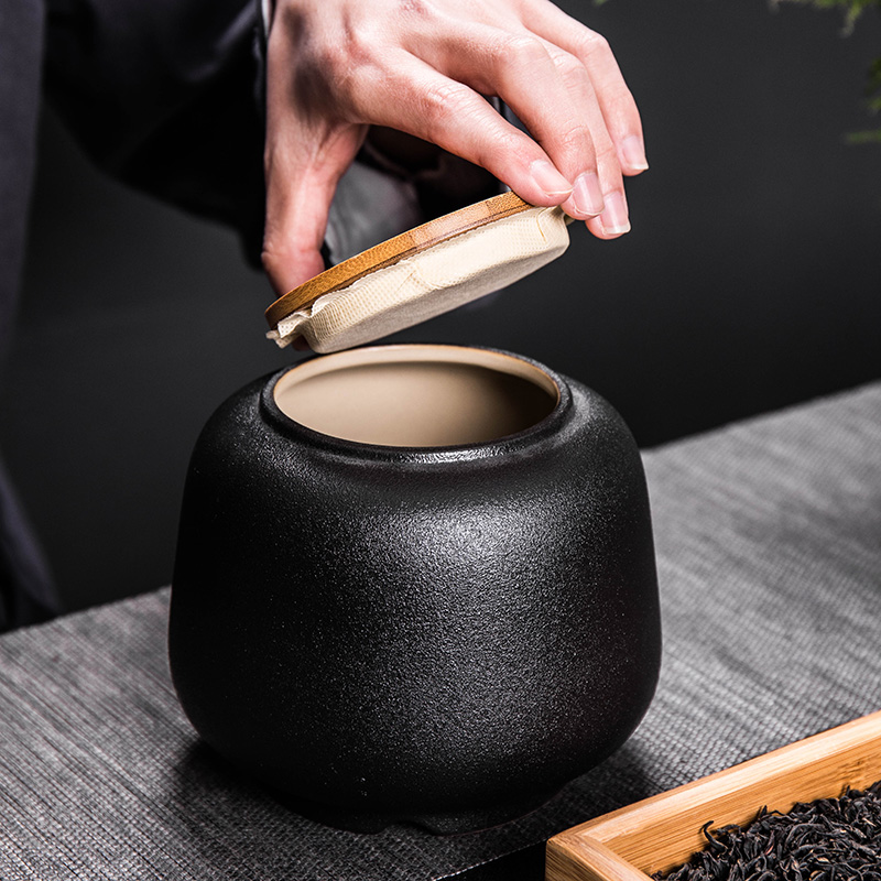 Treasure minister 's ceramic tea pot seal pot of black household size small storage jar small caddy fixings tea boxes