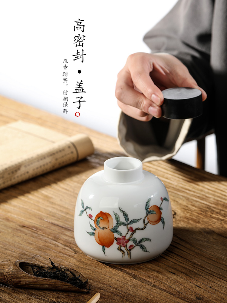 Jingdezhen pure manual white porcelain tea pot hand - made peach ceramic seal pot home tea tea storage tanks