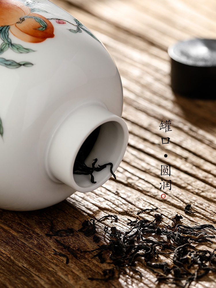 Jingdezhen pure manual white porcelain tea pot hand - made peach ceramic seal pot home tea tea storage tanks