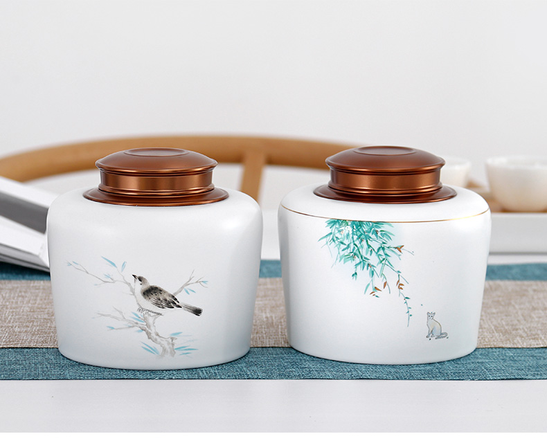 Yu is white porcelain decal caddy fixings ceramic honeypots sealing metal lid loose tea and tea pu - erh tea storage warehouse moistureproof