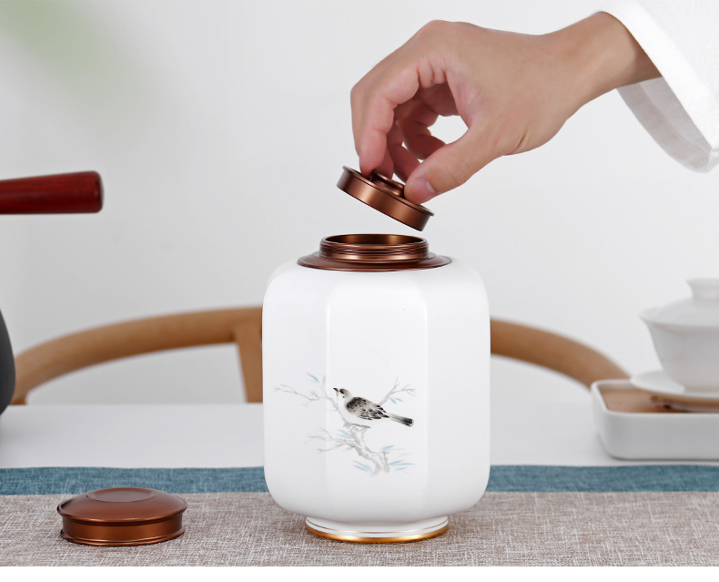 Yu is white porcelain decal caddy fixings ceramic honeypots sealing metal lid loose tea and tea pu - erh tea storage warehouse moistureproof