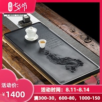 Master Zhixintang handmade whole piece of natural black gold stone tea tray Stone head tea table Large tea sea household Kung Fu tea set