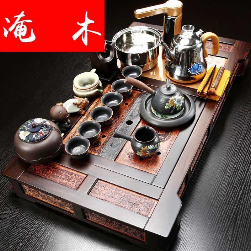 Flooded ebony wood tea tray was violet arenaceous kung fu tea set four unity of a complete set of automatic induction cooker household tea set