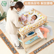 Multifunctional diaper changing table baby bath table baby massage table mobile solid wood storage touch