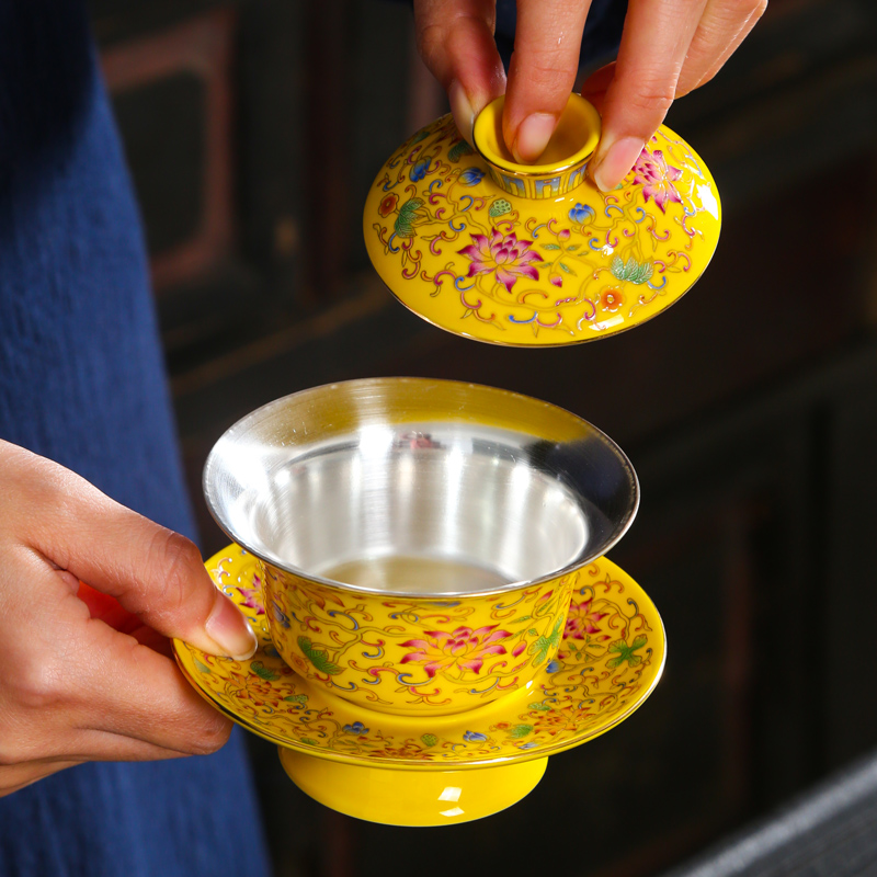 Developing wind gold colored enamel large three tea GaiWanCha silver kung fu tea cup 999 coppering. As ceramic tea set