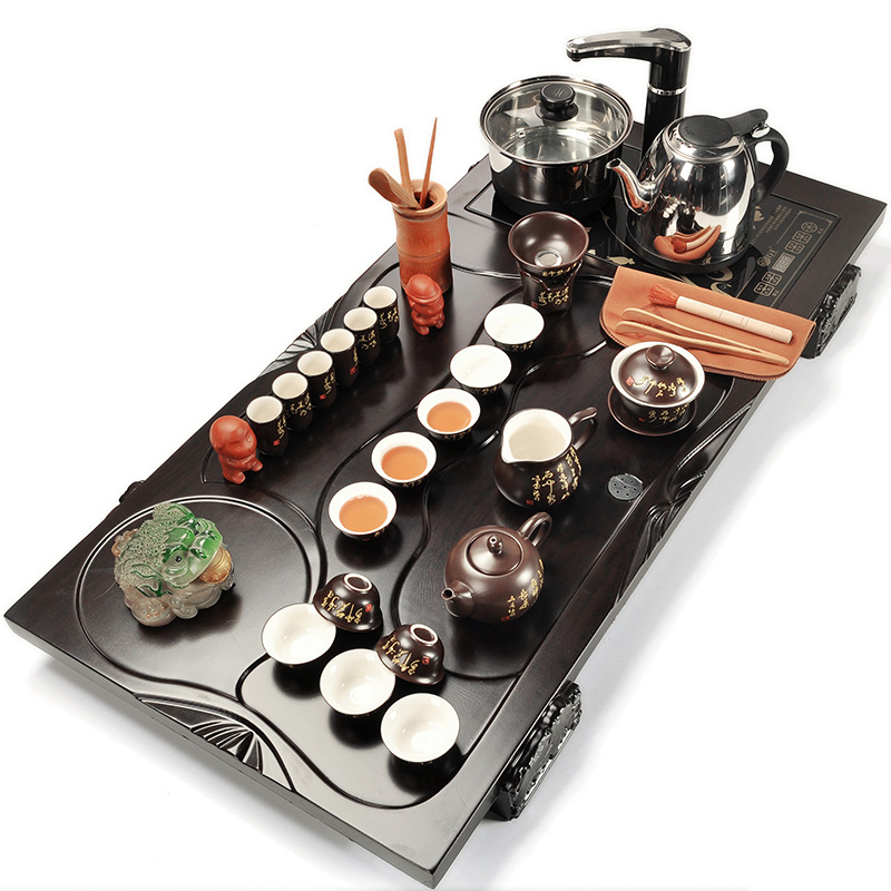 Kung fu of a complete set of purple sand tea set automatic electric magnetic furnace household solid wood tea tray ceramic tea cups