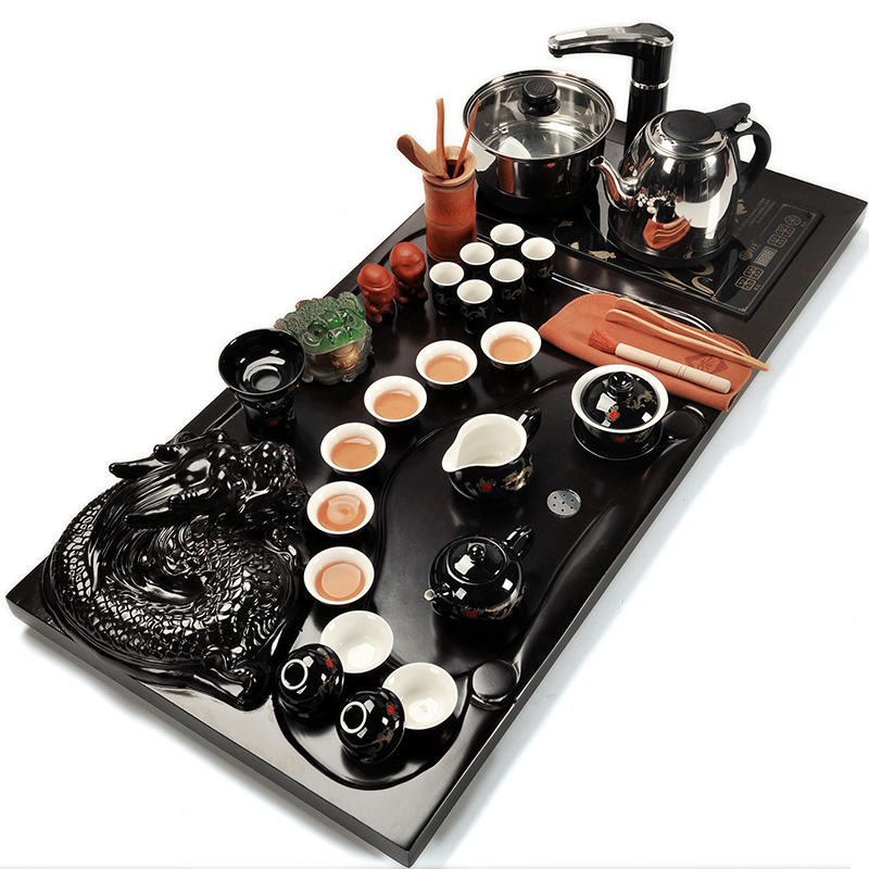 Kung fu of a complete set of purple sand tea set automatic electric magnetic furnace household solid wood tea tray ceramic tea cups