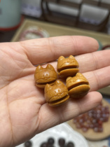 A Laoshantan puppy and a wooden fish