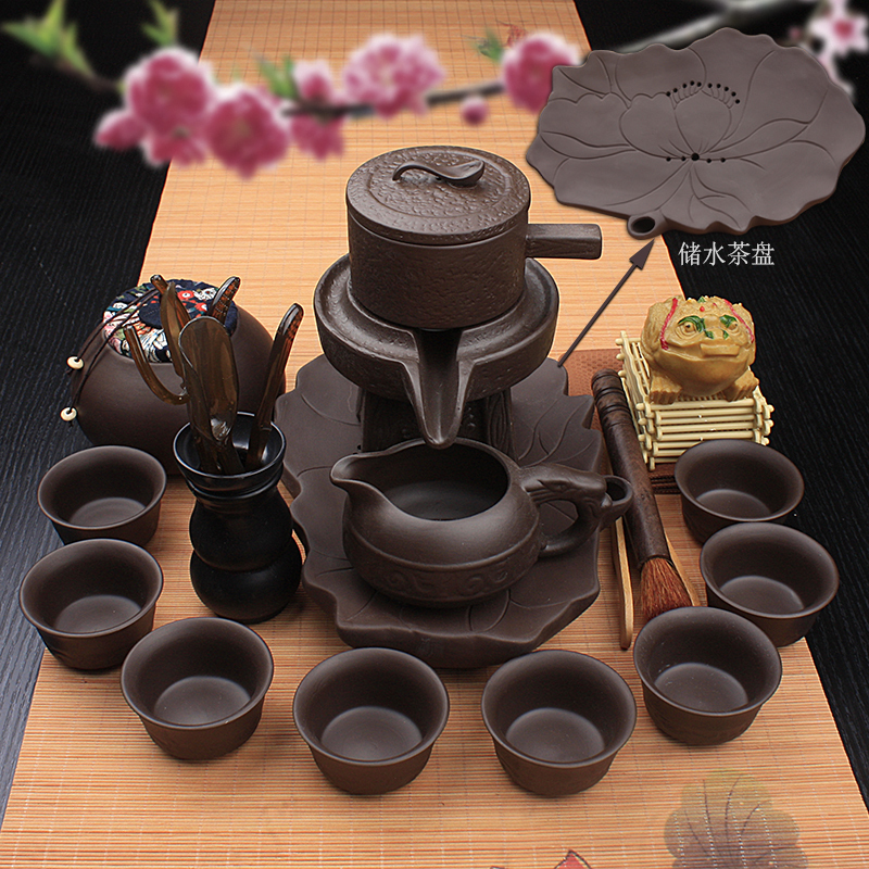 Lazy stone mill tea set ceramic violet arenaceous household kung fu suit all semi - automatic hot tea cups creative tea POTS
