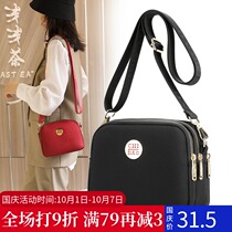 2021 new fashion small square bag solid color shoulder cross Women bag Joker middle-aged mother mobile phone key bag tide