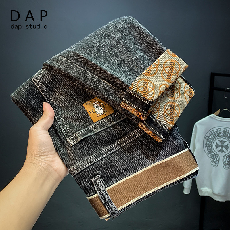 High-end light luxury printed jeans men's autumn 2022 new ins trendy brand Korean version elastic slim pants