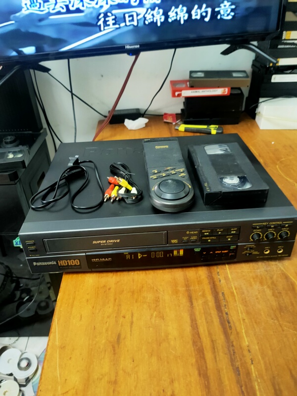 Panasonic Hd100 Video Recorder Comes with Remote Control, Video Tape, Power Cord, and Video Cable