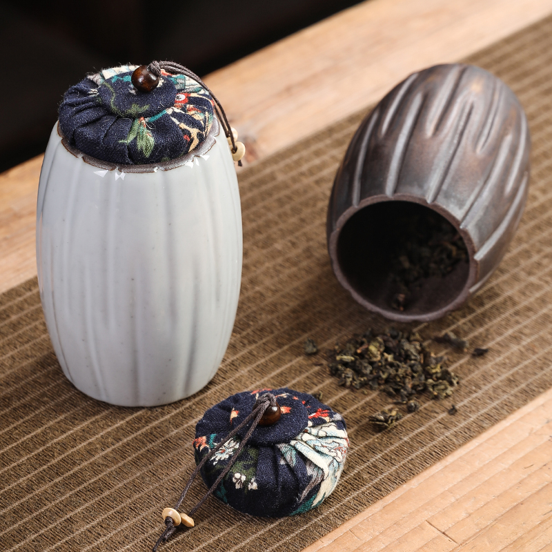 Ceramic tea pot kiln becomes retro storage pot portable vertical rough pottery Pu'er tea sealed pot tea set accessories household