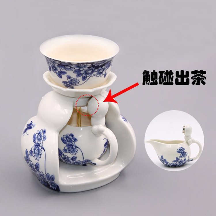 A complete set of ceramic semi - automatic lazy time of blue and white porcelain tea set suits for all artesian hot tea. Preventer gift boxes