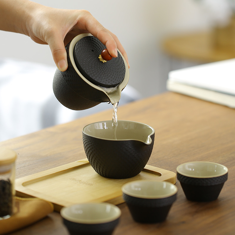 Black pottery travel tea set a pot of three cups of crack portable BaoHu outside office household kung fu teapot trill