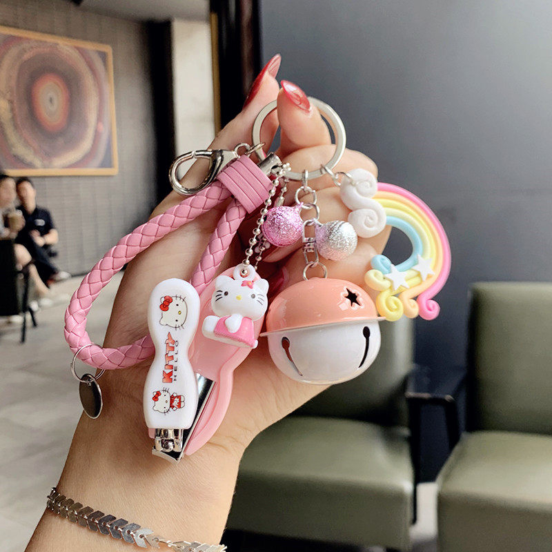 Creative cartoon cute bell keychain men's and women's nail cleats practical calculator key ring backpack pendant