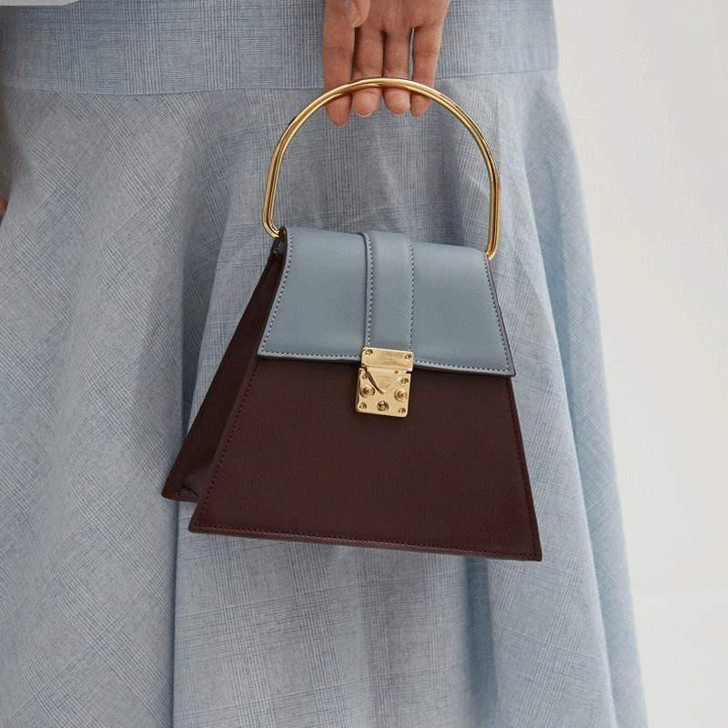 Iron ring handbag ring temperament portable 2021 autumn and winter design new large ring trapezoid