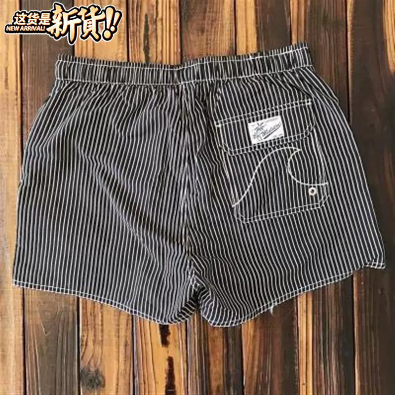 Quần đi biển của nam giới nhanh khô Hải Nam Sanya kỳ nghỉ Quần đùi ba-i có lót sọc quần short thể thao bơi ngắn - Quần bãi biển