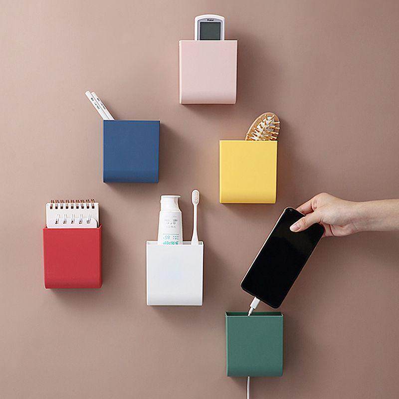 Remote control storage box wall hanging free punch simple table side bedside mobile phone air conditioning remote control board storage shelf
