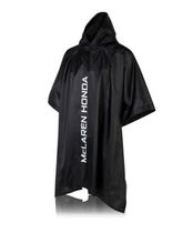 Official McLaren F1 racing supplies surrounding raincoat cloak