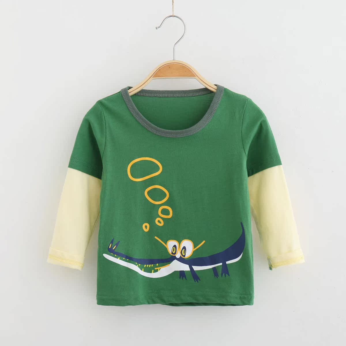 Chàng trai t-shirt dài tay áo 2019 mùa xuân và mùa thu mới baby khí nước ngoài bông nối tay áo đáy in hit triều đứa trẻ.