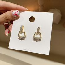 South Koreas East Gate Hollowed-out Insert Diamond Earrings Female Minimalist Bag Design Fashion Lukewarm Air Ear Nail 100 Hitch Accessories