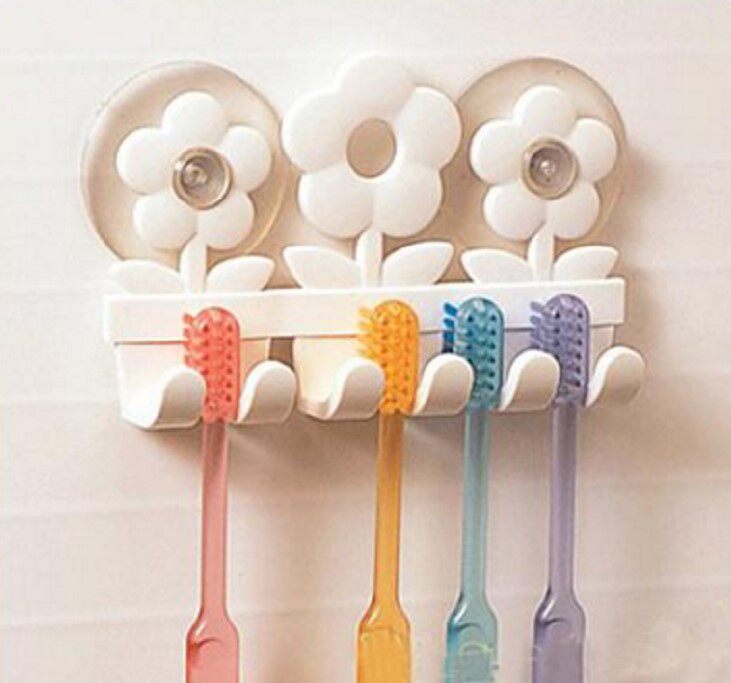 Korean imported strong suction without punching exquisite toothbrush rack with cute smiley face tooth collection frame hook