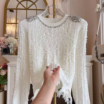 Temperament trendy knitted sweater women's spring 2026 heavy industry shoulder diamond tassel irregular sweater bottoming shirt