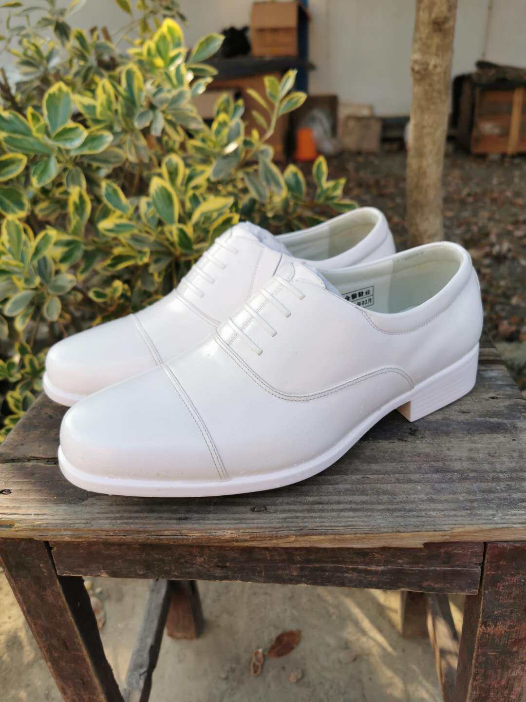 White leather shoes.