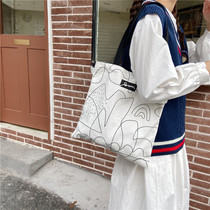  2021 spring and summer new tote bag canvas bag female ins super fire shoulder Japanese niche simple design canvas bag