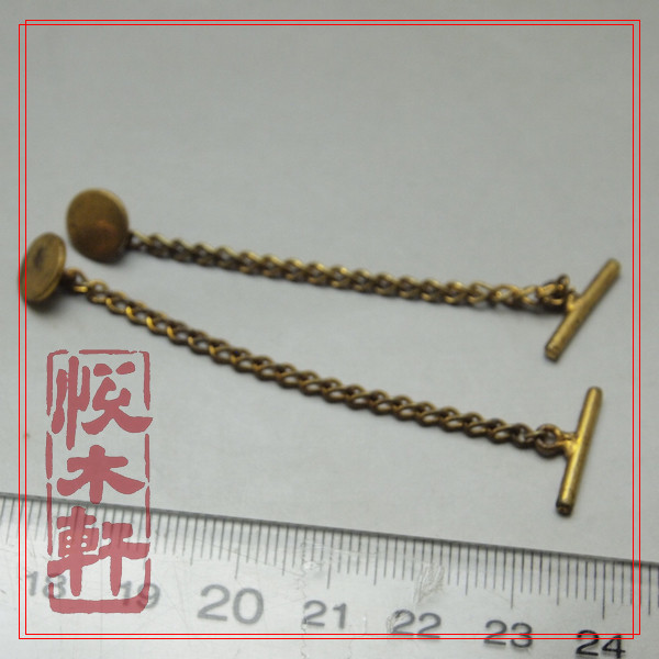 A pair of antique American gold button cufflinks with traces of use Main chain length: 65 cm