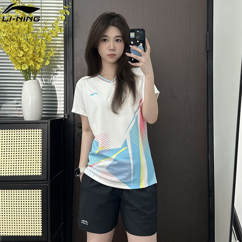 เสื้อผ้าแบดมินตัน Li-Ning รุ่นใหม่สำหรับผู้หญิง ชุดกีฬาแห้งเร็ว ระบายอากาศดี เสื้อยืดแขนสั้นสำหรับฝึกซ้อม พร้อมซื้อเป็นกลุ่ม