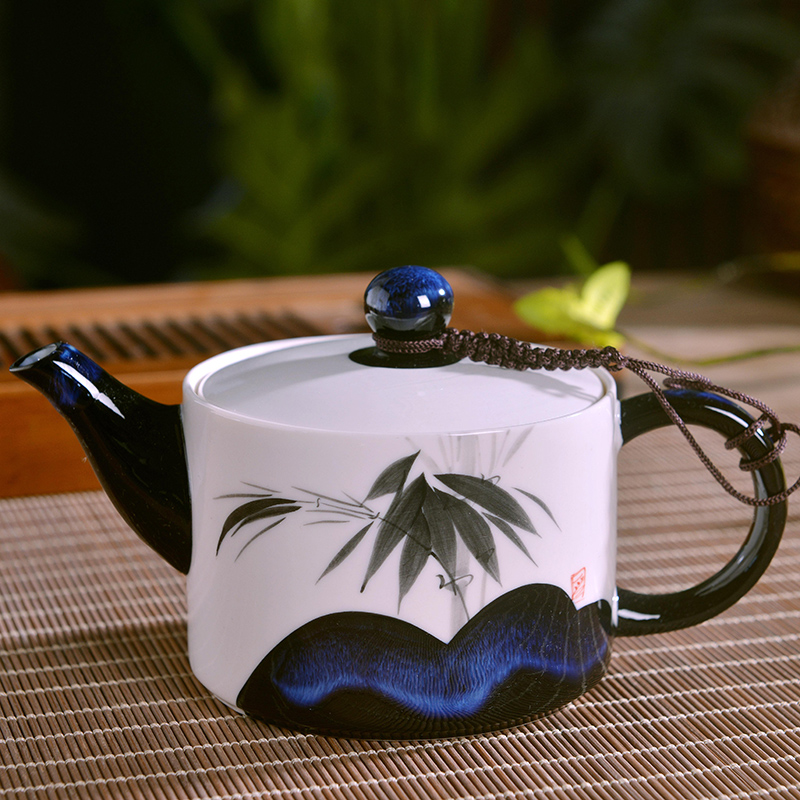 A complete set of jingdezhen ceramic kung fu tea set office household hand - made celadon teacup receives gifts the teapot