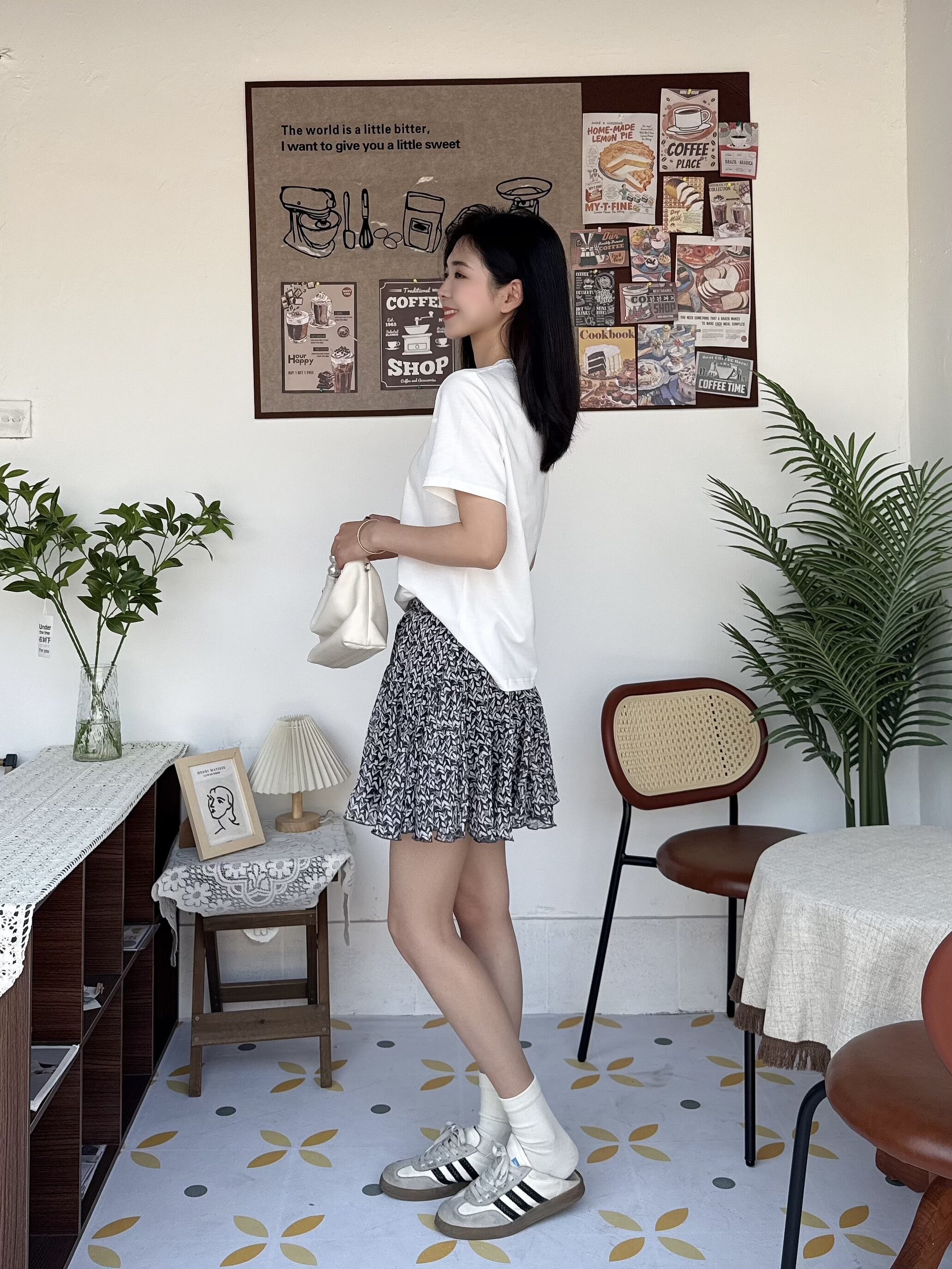 ELLE夏季法式碎花伞裙A字版型遮肉显瘦 碎花图案清新浪漫小众设计别致不撞款