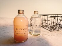 Transparent glass milk tea bottle Beverage bottle Fruit wine bottle Aluminum cap Coffee bottle Light fruit and vegetable juice simple glass sealed bottle