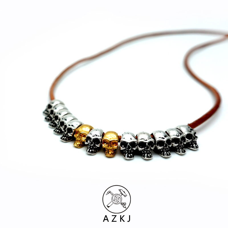 And not gate 24K pure gold pure gold 925 sterling silver corpse forest main skull head card Buddha head three-way pendant