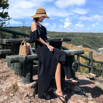 Seaside resort beach dress female Xia Xishuangbanna thin black suspender dress Bohemian long skirt