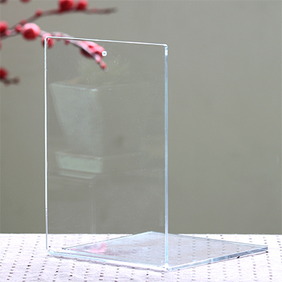 Simple design unprinted transparent acrylic book stand bookend book separated by a single book by the sideboard large custom logo