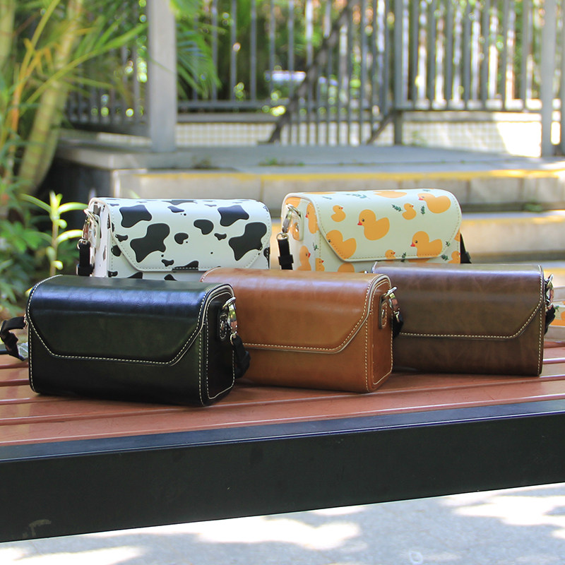 Suitable for Sony ZVE10 Fuji X100V camera bag D-LUX7 Panasonic gf10x8LX1M2 leather case XE4 protection