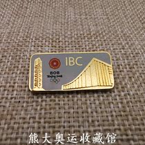 International Olympic Committee News Media Communication Group China Olympic Committee News Media Radio and Television Center badge