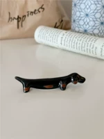 Подставка для палочек для еды в виде черной таксы