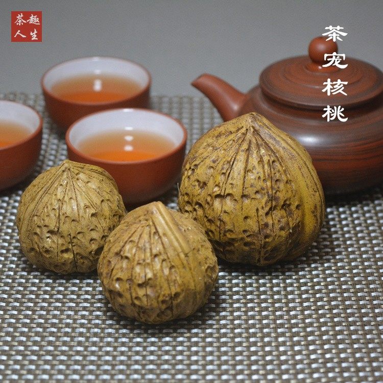 Zisha tea pet ornaments tea play creative handicrafts tea tray ornaments original ore segment mud play text play simulation walnut