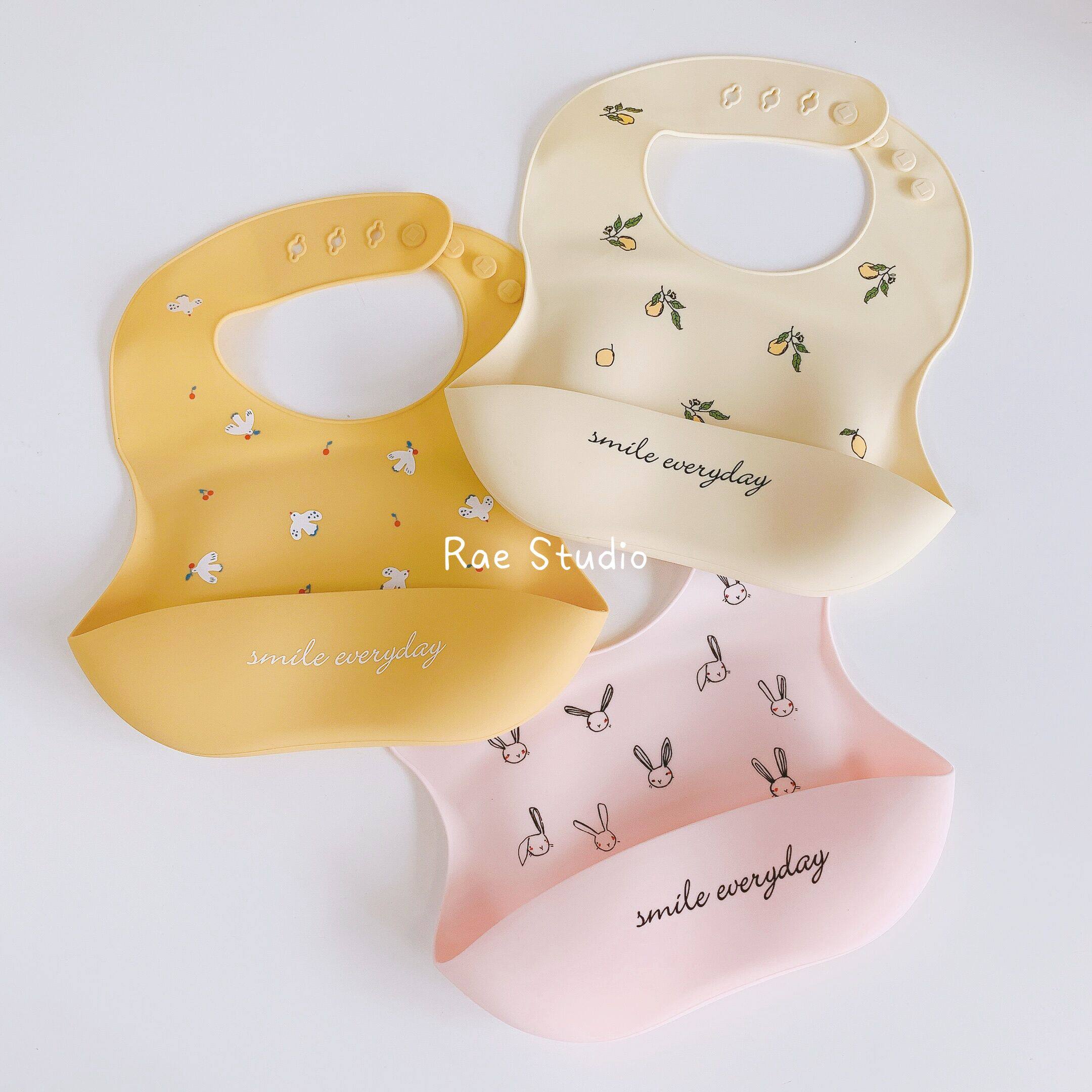 Rae Studio two babies silicone baby silicone around baby food pockets