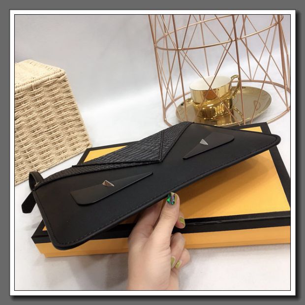Little Monster Eye Clutch 2018 New Leather Envel Ly hợp Túi thông thường Dung lượng lớn Ly hợp Túi da Nam và nữ - Túi của con người túi xách chanel