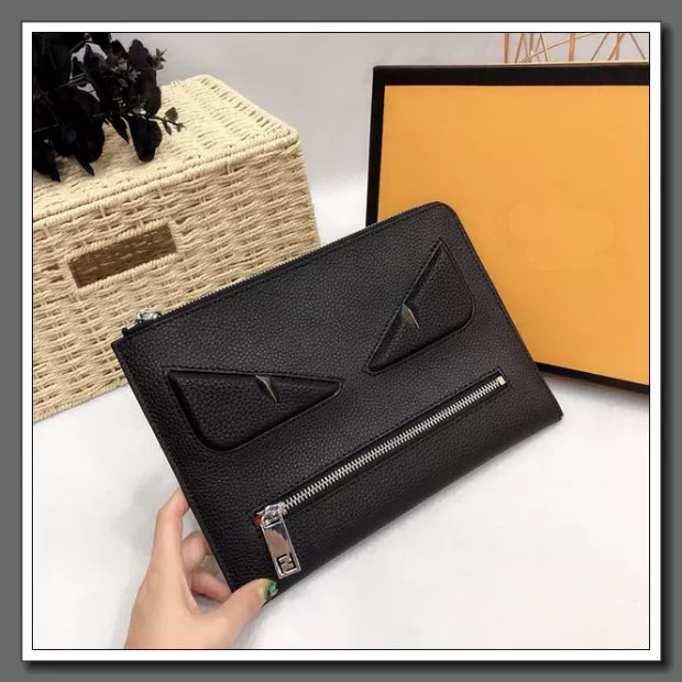 Little Monster Eye Clutch 2018 New Leather Envel Ly hợp Túi thông thường Dung lượng lớn Ly hợp Túi da Nam và nữ - Túi của con người