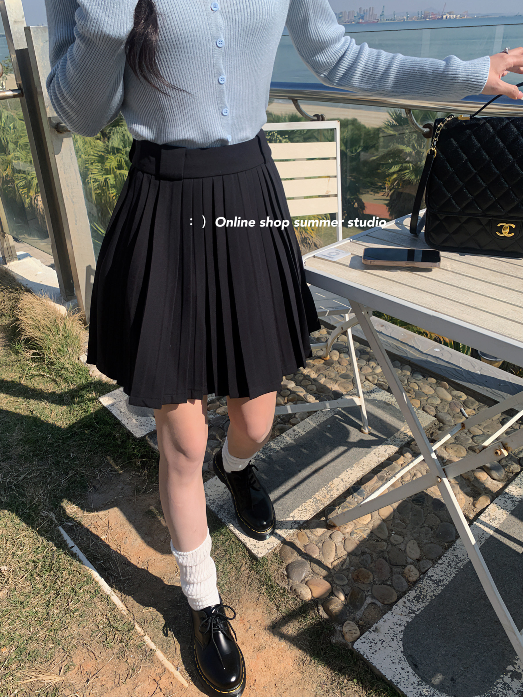 Summer House 2023 new Korean high waist black small, a fold A - word skirt short skirt