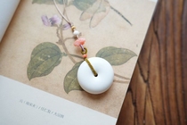 Natural mammoth ivory bagel necklace with coral antique silver