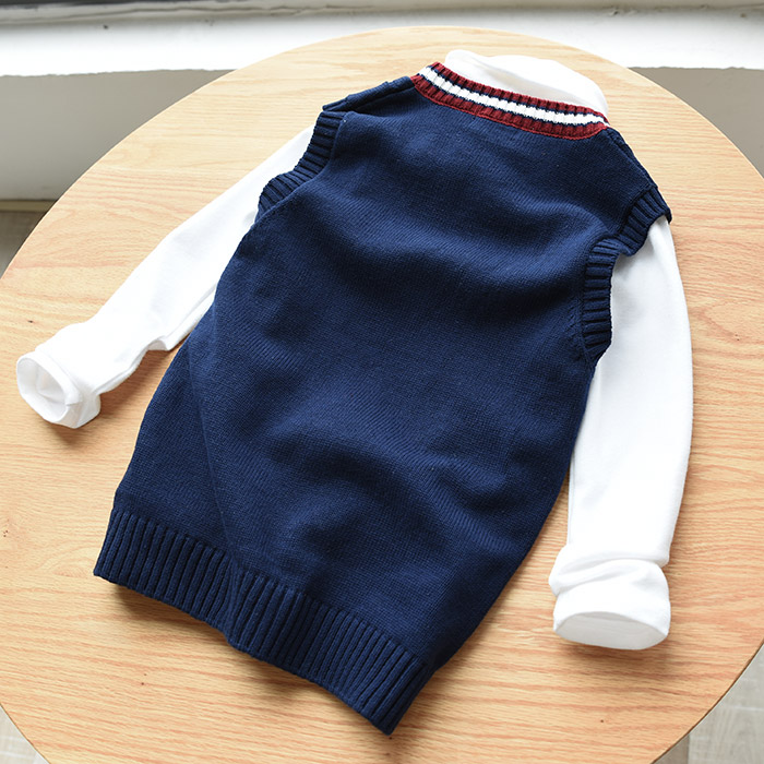 Đại học gió trẻ em áo len cotton cô gái đan vest bướm nơ lớn quần áo trẻ em 10 tuổi